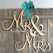 aMonogram Art Unlimited Mr & Mrs Painted Wooden Monogram Wall Décor in Yellow | 12 H x 9 W in | Wayfair 911092P-12-goldglitter