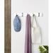 Umbra Flip Solid Wood 5 - Hook Wall Mounted Coat Rack Wood/Metal in White | 2.65 H x 20 W x 1.25 D in | Wayfair 318850-660