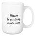 Wrought Studio™ Pagedale Welcome To Our Loving Chaotic Home Coffee Mug Ceramic in Black/Brown/White | 4.62 H in | Wayfair